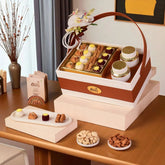 The Heritage Gourmet Tray | Gift Hampers Online featuring assorted baklawa, fusion balls, plain cashews, and almonds in a premium gift box.